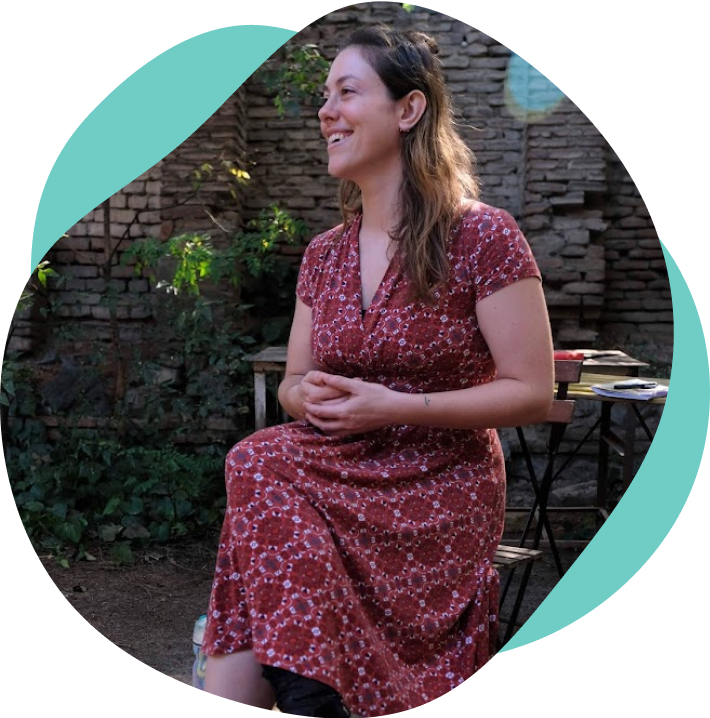 Meg smiling at polyphonic singing event